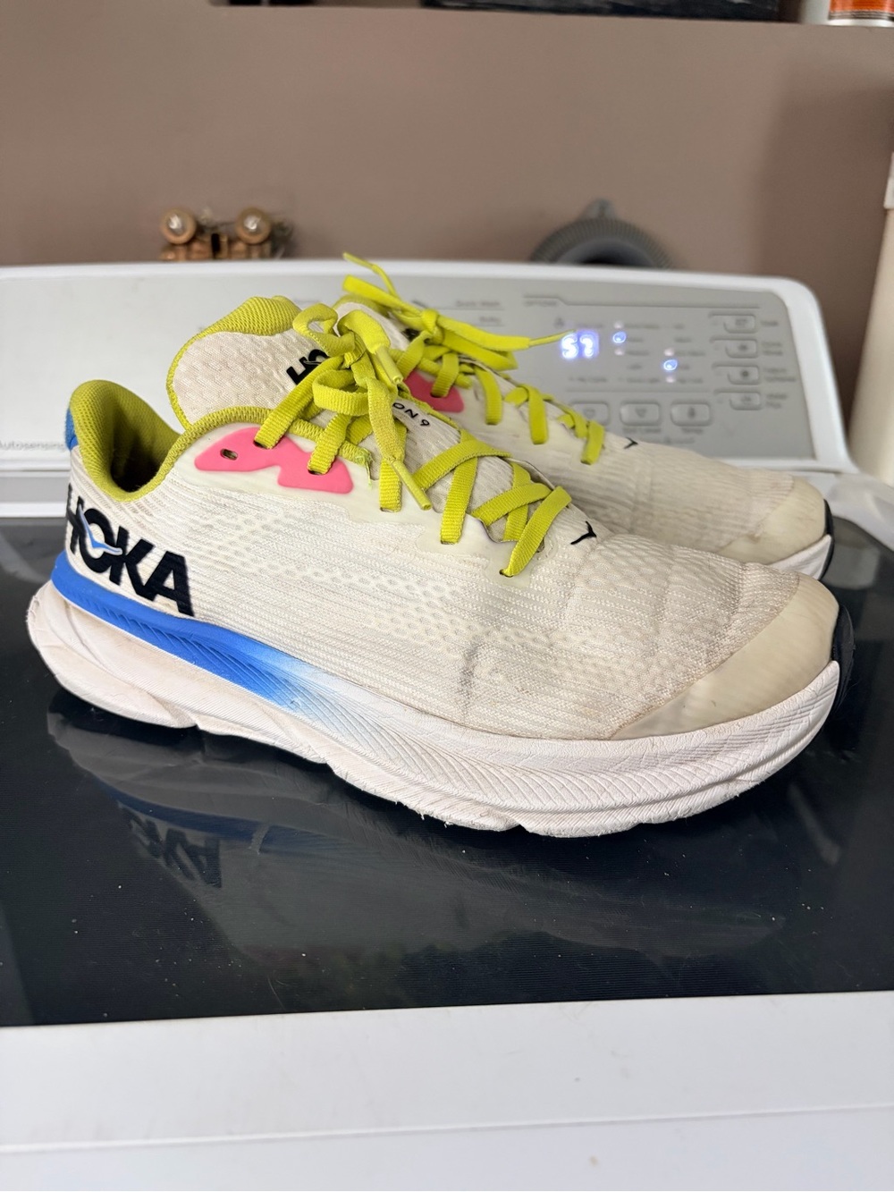 Hoka Yellow and White Running Shoes with Blue Logo Accent